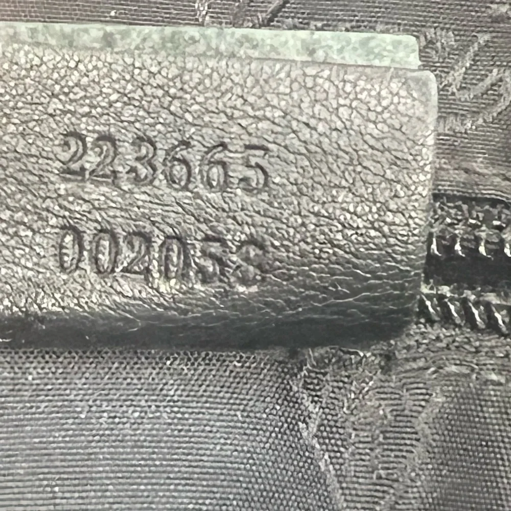 Gucci Guccissima Black Leather Messenger Bag